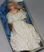 A Victorian clockwork doll, with wax head, height 10in.