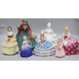 A group of assorted Royal Doulton figures: Lady Charmian, Marie, Tinkle Bell, Chloe, Irene, Victoria