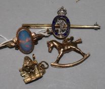 An 15ct gold, enamel and diamond set Royal Corps of Signals brooch, two 9ct gold charms & a 9ct gold