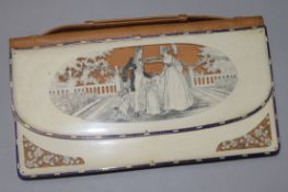 An Edwardian Regency style carved ivory and enamel purse