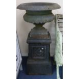 A pair of Victorian cast iron garden urns and pedestals, H.95cm