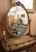 A large Victorian walnut toilet mirror, W.75cm