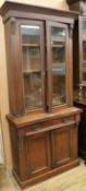 A late Victorian walnut glazed bookcase, H.203cm
