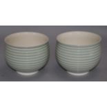 A pair of Keith Murray for Wedgwood ribbed pottery bowls, height 4in.