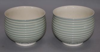 A pair of Keith Murray for Wedgwood ribbed pottery bowls, height 4in.