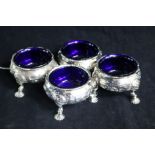 A set of four George II later embossed silver bun salts by David Hennell I, London, 1752, 8cm.