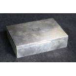 A late 1950's engine turned silver cigarette box