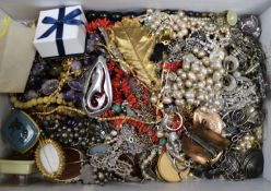 A collection of assorted semi-precious and costume jewellery