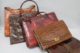 Four various crocodile handbags from 1930's-1960's and a red snake skin bag