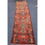 A Hamadan rug, 275cm x 78cm