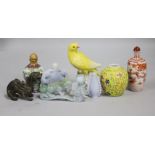 A collection of Chinese snuff bottles, jadeite carvings and a Meissen canary