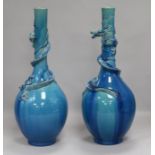 A pair of turquoise Oriental dragon vases