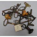 A quantity of watch keys and winders, etc