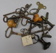 A quantity of watch keys and winders, etc
