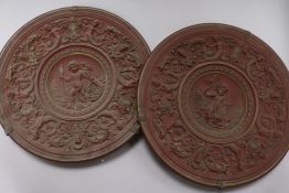 A pair of late 19th century French ceramic wall plaques, by J Marrech, 12.5in.