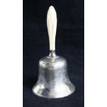 A Victorian silver hand bell by Martin, Hall & Co, Sheffield, 1877, with carved ivory handle, 15.