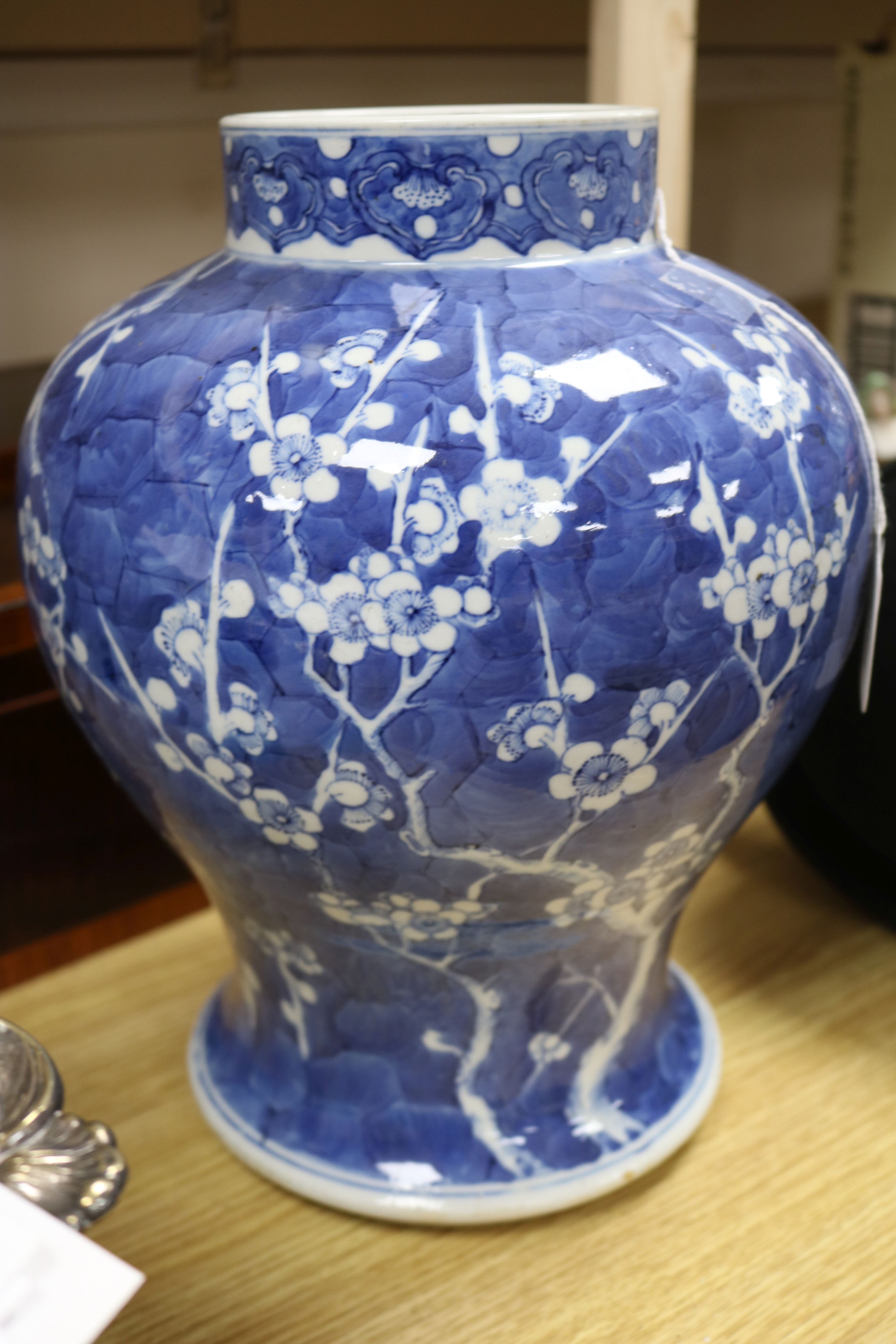 A 19th century Chinese large blue and white baluster vase decorated with prunus - Image 2 of 5
