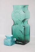 Frank Thrower. A green glass 'Sunflower' vase FT35 and a similar pattern vase
