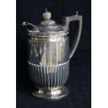 A late Victorian demi fluted silver hot water pot by Henry Stratford, Sheffield, 1894, 23cm gross