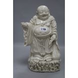 A Chinese blanc de chine figure of Budai