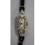 A lady's 1930's/1940's 18ct gold, platinum and diamond set cocktail watch.