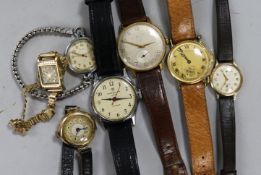 A group of wrist watches including two 9ct gold and one other yellow metal.