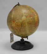 An 8 Inch Terrestial Globe by Geographia Ltd, 55 Fleet Str., London E.C.4, on turned ebonised stand
