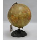 An 8 Inch Terrestial Globe by Geographia Ltd, 55 Fleet Str., London E.C.4, on turned ebonised stand