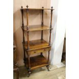 A rosewood 4-tier whatnot with drawer, H.124cm