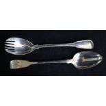 A William IV fiddle pattern silver basting spoon, London 1934, A B Savory & sons and a salad server,