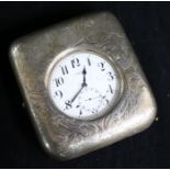 An American sterling silver travelling watch case with large nickel cased Majestic pocket watch.