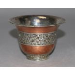 A Tibetan silver and copper flared cup, diameter 3.75in.