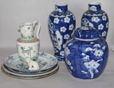 A pair of Chinese vases , a prunus jar, plates etc.