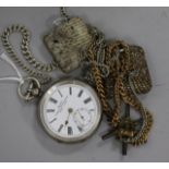 Two travelling watches and a silver pocket watch.
