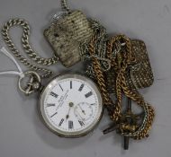 Two travelling watches and a silver pocket watch.
