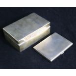 A 1920's silver cigarette box and a late silver cigarette case