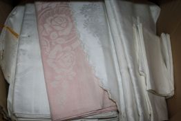 A quantity of Damask sheets and bedspreads