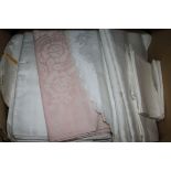 A quantity of Damask sheets and bedspreads