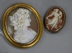 Two mounted cameo brooches.