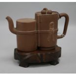 A Yixing double teapot, with wood stand