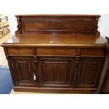 A Victorian mahogany chiffonier fitted three drawers, W.139cm