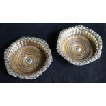 A pair of 19th century Old Sheffield plated wine coasters, 17cm.