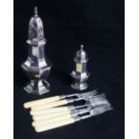 A silver baluster sugar caster, a silver pepper and a set of six silver fruit forks, Sheffield 1901,