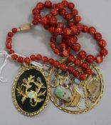 A Chinese 18ct gold and multi gem set pierced circular pendant, one other pendant and two items of