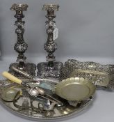 A pair of silver-plated candlesticks with acanthus leaf decoration, two Chilean 900 standard items