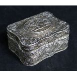 A Continental 19th century silver (800) and silver-gilt trinket box, of shaped rectangular form,
