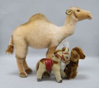 A Steiff camel, a Steiff 1960's miniature pony and an Irish Setter, all with button in ear