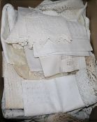 A large collection of crochet and hand cut work lace and other linen table cloths, napkins, etc.