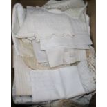 A large collection of crochet and hand cut work lace and other linen table cloths, napkins, etc.