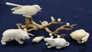 A carved ivory animal group